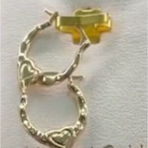14k Gold Heart Hoop Earrings $180.
THIS IS SOLD !!! In my other platform. Sorry